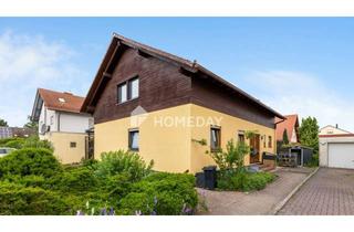 Mehrfamilienhaus kaufen in 67133 Maxdorf, Teilvermietetes Mehrfamilienhaus mit Garten, Terrasse und Garage in begehrter Wohnlage