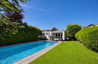 Haus kaufen in 61169 Friedberg, Freistehender Bungalow mit Außenpool auf traumhaftem Sonnengrundstück – Wohnen mit Ruhe, Privats