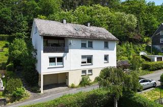 Haus kaufen in 57234 Wilnsdorf, Vielseitig nutzbares Zweifamilienhaus mit zwei Garagen und Garten in ruhiger Ortslage