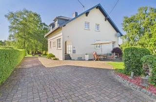 Haus kaufen in 54619 Eschfeld, Hochwertiges, modernisiertes Wohnhaus mit Werkstatthalle auf 7.000 m² nahe Luxemburg & Belgien!
