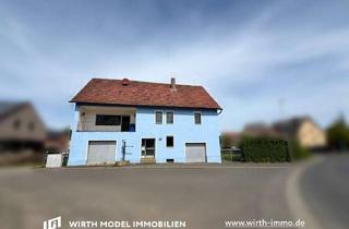 Haus kaufen in 97453 Schonungen, Immobilie mit zwei Garagen auf großem Grundstück | Reichmannshausen