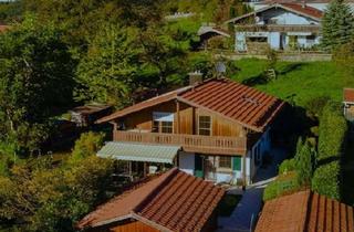 Einfamilienhaus kaufen in Am Martlberg 10, 83365 Nußdorf, Charmantes Einfamilienhaus mit großzügigem Garten, Garage und großem Carport in Nußdorf am Chiemsee