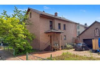 Haus kaufen in 32339 Espelkamp, Zweifamilienhaus mit Potenzial: Wohnen, Vermieten oder beides in ruhiger Lage von Espelkamp