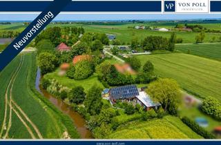 Einfamilienhaus kaufen in 26553 Dornum, Einfamilienhaus mit Gartenidylle und Einliegerwohnung in Feldrandlage von Nesse