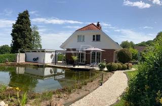 Einfamilienhaus kaufen in 58708 Menden, Modernes Energiesparhaus mit traumhaftem Schwimmteich in ruhiger Ortsrandlage von Menden-Halingen