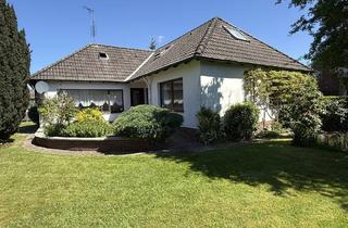 Haus kaufen in 26441 Jever, Charmanter Bungalow mit vielen Möglichkeiten