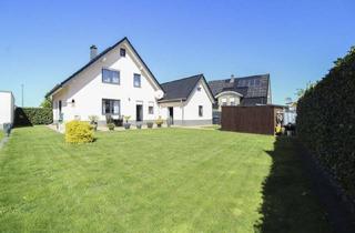 Einfamilienhaus kaufen in 33154 Salzkotten, Salzkotten - Neuwertiges Einfamilienhaus mit Fußbodenheizung, Kamin, Garage und schönem Garten in Niederntudorf