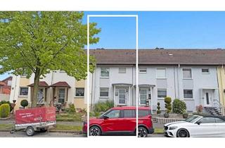 Haus kaufen in 46562 Voerde, Voerde - Familienfreundliches Reihenmittelhaus in Voerde-Stadt mit Garage, Keller und viel Potenzial