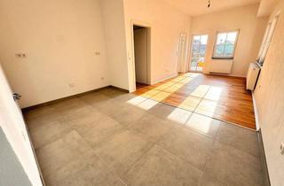 Wohnung kaufen in Erlanger Straße 11, 91093 Heßdorf, Provisionsfrei - Renovierte 3 Zimmer Wohnung mit Terrasse und Stellplatz in Heßdorf