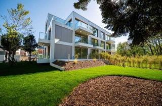 Wohnung kaufen in 56567 Neuwied, Ihr privater Garten direkt an der Wied – Erdgeschosswohnung mit 225 m² Garten, Terrasse, zwei Balko