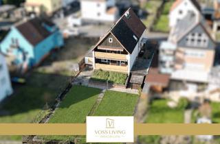 Haus kaufen in 61206 Wöllstadt, Ein-| Zweifamilienhaus mit 2 Balkonen, Garten, Keller, Garage und 2 KFZ Stellplätzen in Feldrandlage