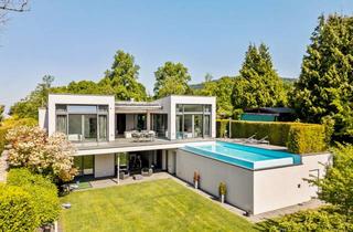 Villa kaufen in 76530 Innenstadt, Exklusive Villa mit Infinity-Pool und unverbaubarem Blick über den Schwarzwald in Bestlage