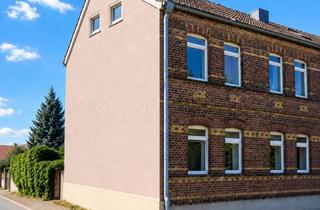 Haus kaufen in 06779 Raguhn, 2-Familien-Reihenendhaus mit Gartengrundstück