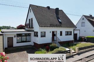 Einfamilienhaus kaufen in 56235 Ransbach-Baumbach, Einfamilienhaus mit Einliegerwohnung/Büro auf schönem Grundstück
