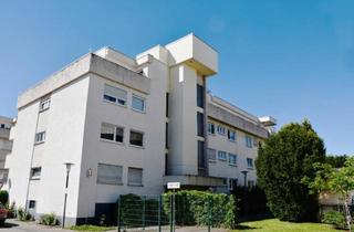 Wohnung kaufen in 64572 Büttelborn, Sonnige 2-Zimmer-Eigentumswohnung mit Balkon und Pkw-Stellplatz in Büttelborn