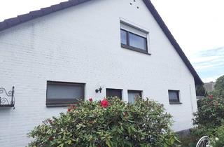 Einfamilienhaus kaufen in 29693 Hodenhagen, Zentral und ruhig gelegenes Eck-Grundstück; gepflegter Garten mit Garage