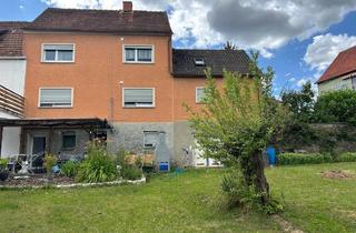 Einfamilienhaus kaufen in 97711 Poppenlauer, vermietetes Zweifamilienhaus mit Garage und Kfz-Stellplatz
