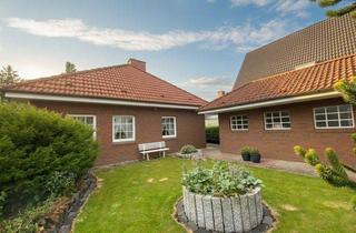 Haus kaufen in 25709 Marne, Walmdachbungalow in Marne - Stilvolles Wohnen mit Gartenblick und Wintergarten!