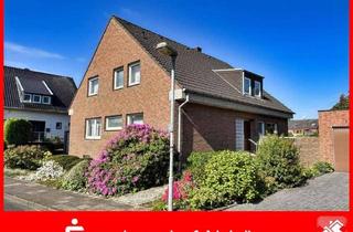 Haus kaufen in 47918 Tönisvorst, Tönisvorst - Freistehendes Zweifamilienhaus mit zwei Garagen