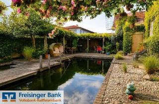 Wohnung kaufen in 85399 Hallbergmoos, Wohnen wie im Urlaub – 4-Zimmer-Wohnung mit mediterraner Oase & Naturpool in Hallbergmoos