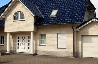 Einfamilienhaus kaufen in 33428 Harsewinkel, Außergewöhnliches Einfamilienhaus mit Wellnessbad, Kamin und repräsentativem Wohnambiente