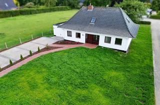 Einfamilienhaus kaufen in 27607 Langen, Einfamilienhaus (Nordhaus-Fertighaus) mit Terrasse und Garage im schönen Sievern