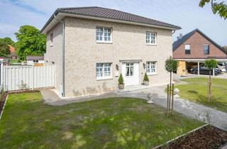 Villa kaufen in 26427 Dunum, Exklusive Stadtvilla mit hochwertiger Ausstattung und zeitloser Eleganz!