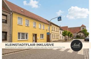 Haus kaufen in 16868 Wusterhausen, Mehr Platz für Ihre Ideen – vielseitiges Stadthaus mit Werkstatt und Garage in zentraler Lage