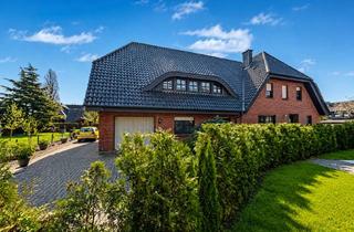 Haus kaufen in 49479 Ibbenbüren, Charmantes Zweifamilienhaus mit großem Grundstück in ruhiger Lage von Ibbenbüren-Dörenthe