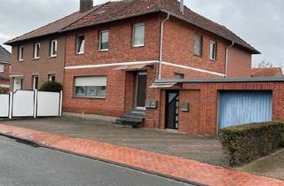 Haus kaufen in 48683 Ahaus, Ahaus - DHH mit zwei Anlieger Wohnung