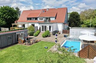 Doppelhaushälfte kaufen in 27356 Rotenburg, Großzügige Doppelhaushälfte mit Pool und 799 m² Grundstück
