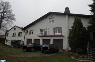Einfamilienhaus kaufen in 08223 Falkenstein, Objekt-Nr.: 15024 - Einfamilienhaus mit Balkon und 4 Garagen auf großem Grundstück in Falkenstein