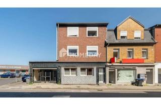 Mehrfamilienhaus kaufen in 52477 Alsdorf, Solides Mehrfamilienhaus mit freier Gewerbefläche, Terrasse, Balkon und Stellplätzen in Alsdorf