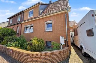 Doppelhaushälfte kaufen in 31241 Ilsede, Hier den Sommer genießen: Gepflegte Doppelhaushälfte mit Garten und Garage in Groß-Ilsede