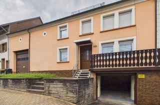 Bauernhaus kaufen in 66333 Völklingen, Lauterbach: Charmantes Bauernhaus 137m² auf großem Grundstück mit zwei Garagen und Gartenzufahrt.