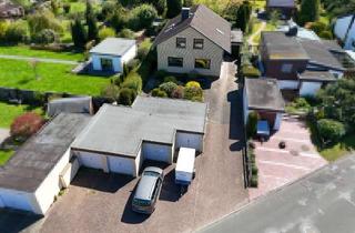 Einfamilienhaus kaufen in 27607 Langen, Großes Einfamilienhaus mit 5 Garagen und idyllischem Garten auf 1945 m² Grundstück im schönen Langen