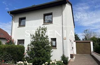 Einfamilienhaus kaufen in 55232 Alzey, Provisionsfrei: Einfamilienhaus mit Wintergarten & Garage auf großem Grundstück