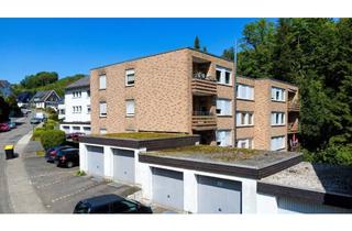 Mehrfamilienhaus kaufen in 57462 Olpe, 11 Wohneinheiten in Olpe-Stadt: Mehrfamilienhaus mit Garagen, Stellplätzen und eigenem Bunker