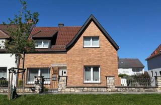 Doppelhaushälfte kaufen in 59590 Geseke, Charmante Doppelhaushälfte mit Garten & Garage in Geseke