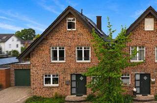 Haus kaufen in 59320 Ennigerloh, Stilvolle KfW-60 DHH mit Wintergarten, ausgebautem Dachgeschoss und neuer Heizungsanlage