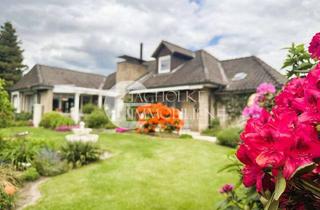 Haus kaufen in 29574 Ebstorf, Wohnen wie im eigenen Park – Exklusiver Bungalow mit traumhafter Gartenanlage in Ebstorf