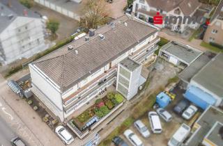 Anlageobjekt in 52134 Herzogenrath, Modernisiertes Niedrigenergiehaus mit 11 Parteien, Garagen und Stellplätzen im Herzen von Kohlscheid