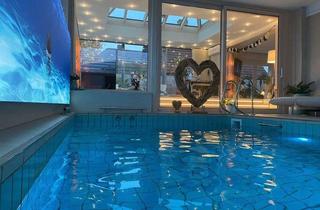 Villa kaufen in 31535 Neustadt, „Exklusive Wellnessvilla am Steinhuder Meer | 335 m² Wohnfläche | Indoor Pool | Wintergarten