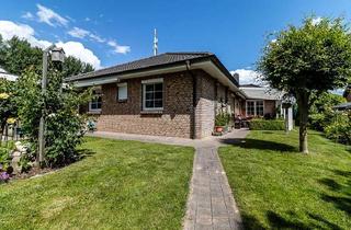 Haus kaufen in 24351 Damp, Stilvoller Bungalow mit Sauna, Kaminofen und sonnigem Garten!