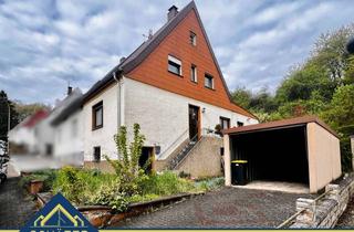 Doppelhaushälfte kaufen in 66352 Großrosseln, Doppelhaushälfte mit Garten und Garage - Ihr Sanierungsprojekt mit Potenzial in Großrosseln