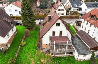 Haus kaufen in 85774 Unterföhring, Unterföhring: Viel Platz für Ihre Ideen – Zweifamilienhaus mit Baugrund
