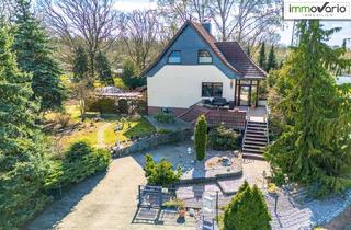 Einfamilienhaus kaufen in Parchener Straße 20a, 39317 Parey, Wohntraum mit XXL-Grundstück: Freistehendes Einfamilienhaus mit Pool, Wintergarten, Sauna und Kamin
