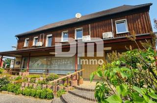Haus kaufen in 37586 Dassel, Gepflegtes Ein- bis Zweifamilienhaus mit Ladeneinheit in Dassel-Hilwartshausen