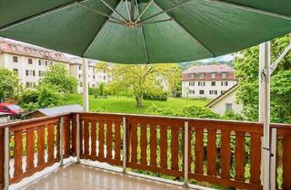 Haus kaufen in 70435 Stuttgart, Stuttgart - Charmante Altbauwohnung mit grünem Balkon & hohen Decken