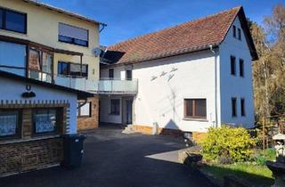 Haus kaufen in 35444 Biebertal, Biebertal - Zweifamilienhaus in ruhiger Lage